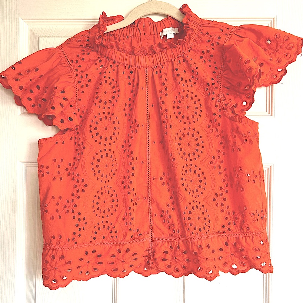 Jennifer Grace orange blouse